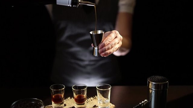 Bartender making a cocktail shot