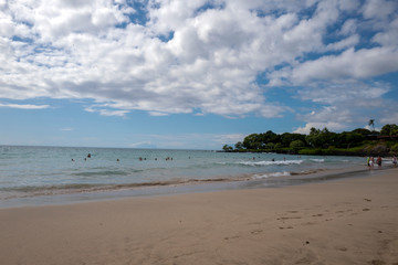 Beautiful beach with waves sand people and fun