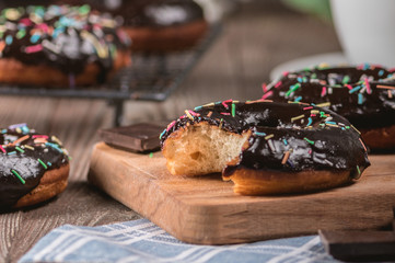 Donuts with chocolate glaze with sprinkles