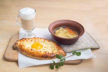 business lunch of khachapuri, soup and coffee. Georgian Restaurant