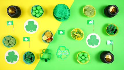 St Patrick's Day creative composition flat lay layout with chocolate coins, leprechaun hat and...
