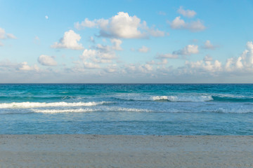 Ocean waves during sunset at Cancun, Yucatan, Mexico