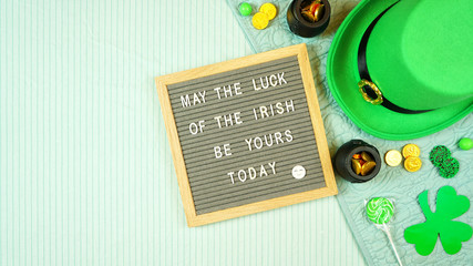 St Patrick's Day hygge style creative composition flat lay layout with leprechaun hat, chocolate...