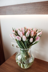 Romance in the bedroom with tulips