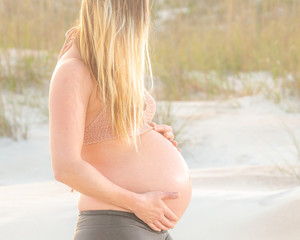 pregnant woman on beach