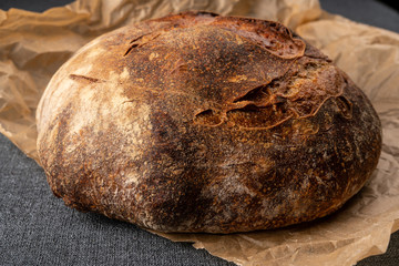 fresh bread and wheat on the wooden