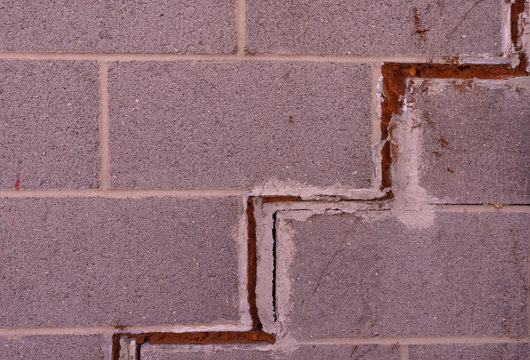 Large Crack In A Foundation With Concrete Blocks