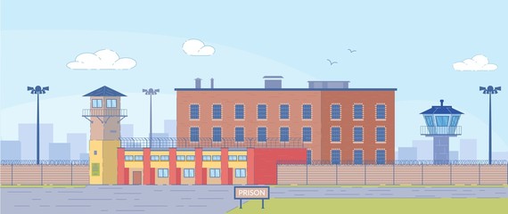 Prison Building Surrounded by High Fence Exterior.