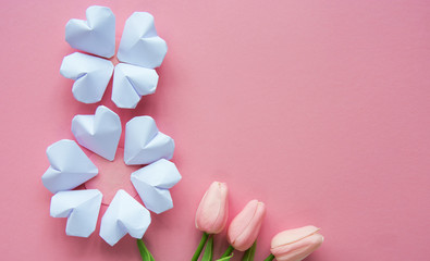 paper hearts shape figure eight 8 on soft pink International Women's Day card