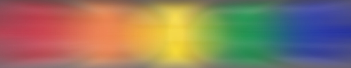 Motion blurred banner graphic of rainbow color gradients