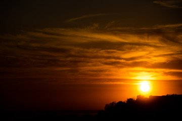 Contrast background with a bright setting sun