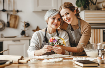 happy mother's day! family old grandmother  mother-in-law and daughter-in-law daughter congratulate...