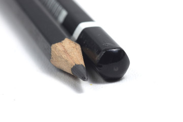 Graphite wooden pencil on an isolated white background