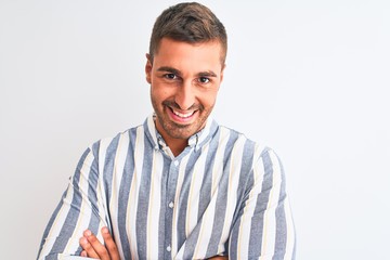 Obraz premium Young handsome business man wearing elegant shirt over isolated background happy face smiling with crossed arms looking at the camera. Positive person.