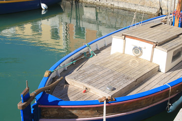 Fototapeta na wymiar Traditional boats in the river port of Frontignan, a seaside resort in the Mediterranean sea, Herault, Occitanie, France