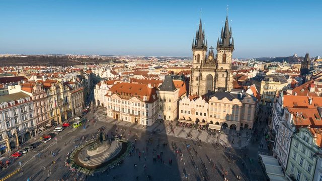 Panoramic timelapse of Old Town Square in Prague from Old Town tower in a sunny winter day with in backgroup the church of Tyn