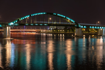 Fototapeta na wymiar Old railway bridge in Belgrade at night