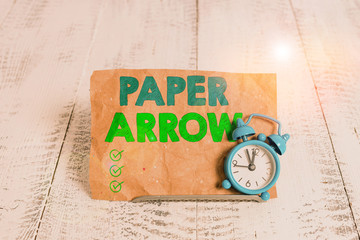 Handwriting text writing Paper Arrow. Conceptual photo Business infographic use to show direction...