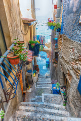 Picturesque streets and alleys in the seaside village, Scilla, Italy - obrazy, fototapety, plakaty