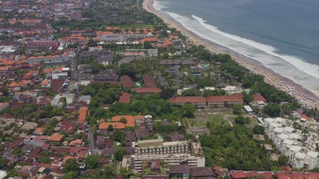 Bali Indonesia Aerial v19 Moving south looking down at Legian beach, Kuta and the coastline - April 2019