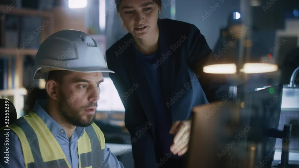 Aufkleber modern factory office: female project manager talks to a male industrial engineer who works on compu