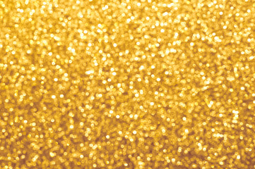 Bokeh blurred abstract shiny gold glitter sparkle shimmer background wallpaper