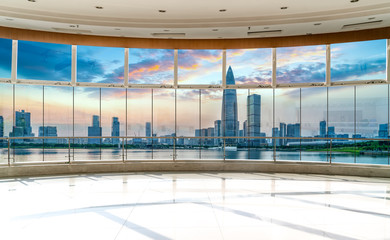 Office building glass and city skyline