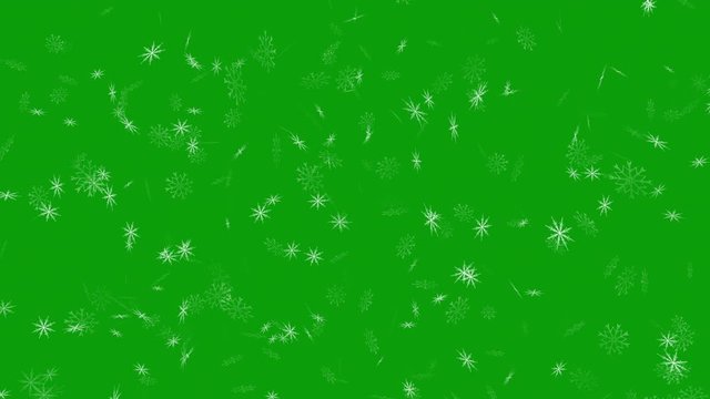 Happy fantasy december season storm creation of white ice 3D snowflakes falling on a green screen holiday background