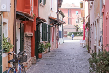 caorle, italy, 02/16/2020 , Little streets in Caorle, a little touristic and hystorical town in the Italian coastline of Adriatic sea.