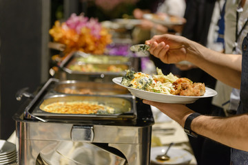 Buffet dinner catering in party. Food and drink all you can eat Concept