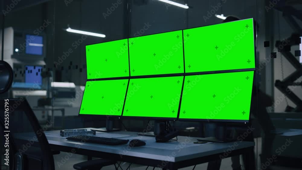 Aufkleber Industry 4.0 Modern Factory: Computer with Multiple Chroma Key / Green Screen Displays. In Background High-Tech Fully Automatic Electronics Producing Industrial Facility