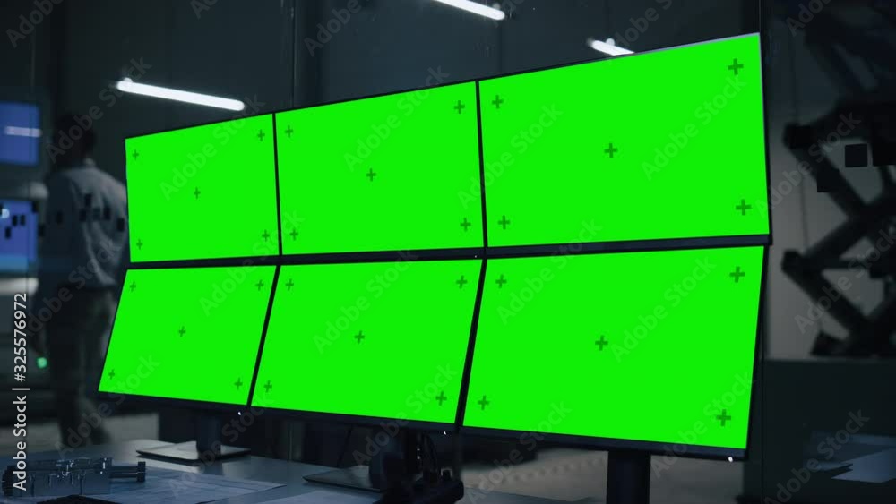 Poster Industry 4.0 Modern Factory: Computer with Multiple Chroma Key / Green Screen Displays. In Background High-Tech Fully Automatic Electronics Producing Industrial Facility