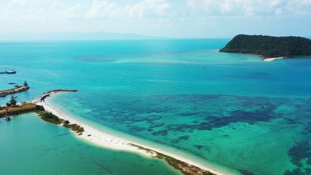 turquoise sea and coral reef with islands and natural sandy wavebreakers. Aerial,Thailand