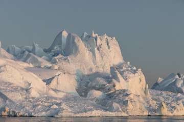 Ice glaciers in Diski Bay during the midnight sun, Ilulissat Icefjord, Greenland