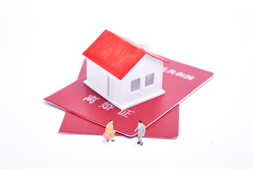 Divorce certificate and house model