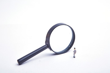 Magnifier and drug capsule