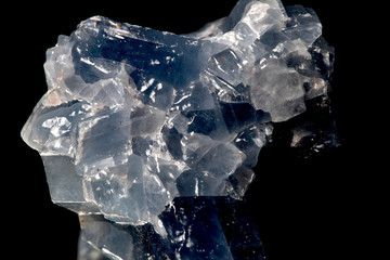 Crystal quartz, healing stone isolated on black background