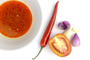 Chili sauce in white background