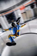 Colorful. Skydiver conquers the world. Skydiving team use professional equipment. Extreme sport for young men.