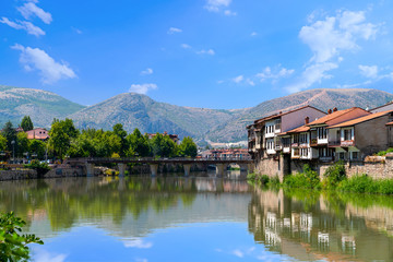 Fototapeta premium Amasya/Turkey- August 09 2019: Panoramic Amasya city view. Beautiful river landscape and Amasya city between mountains.
