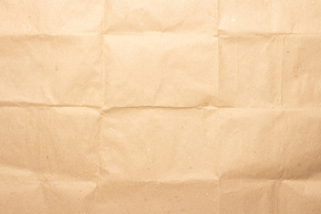 Crumpled brown craft paper. Texture, banner. Can be used as background. Top view, flat lay