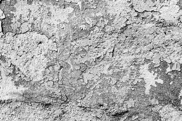 Texture of a concrete wall with cracks and scratches which can be used as a background