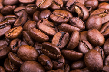 texture and background of brown roasted aromatic coffee