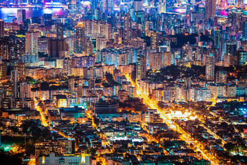 Amazing Hong Kong Night View, Kowloon district, shooting from lion rock peak. Asia - obrazy, fototapety, plakaty