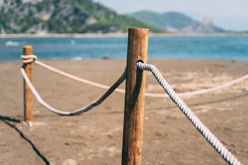 Obraz premium fence on the beach