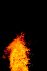 Yellow red and orange fire flames blazing fiery burning isolated on a black background