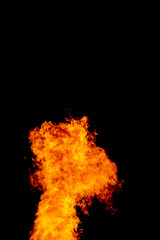 Yellow red and orange fire flames blazing fiery burning isolated on a black background