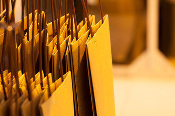 Fototapeta premium decorative paper bags photographed on shelves, in a flower shop
