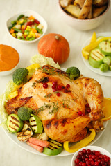 Tasty baked turkey for Thanksgiving day on table