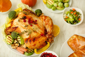 Tasty baked turkey for Thanksgiving day on table